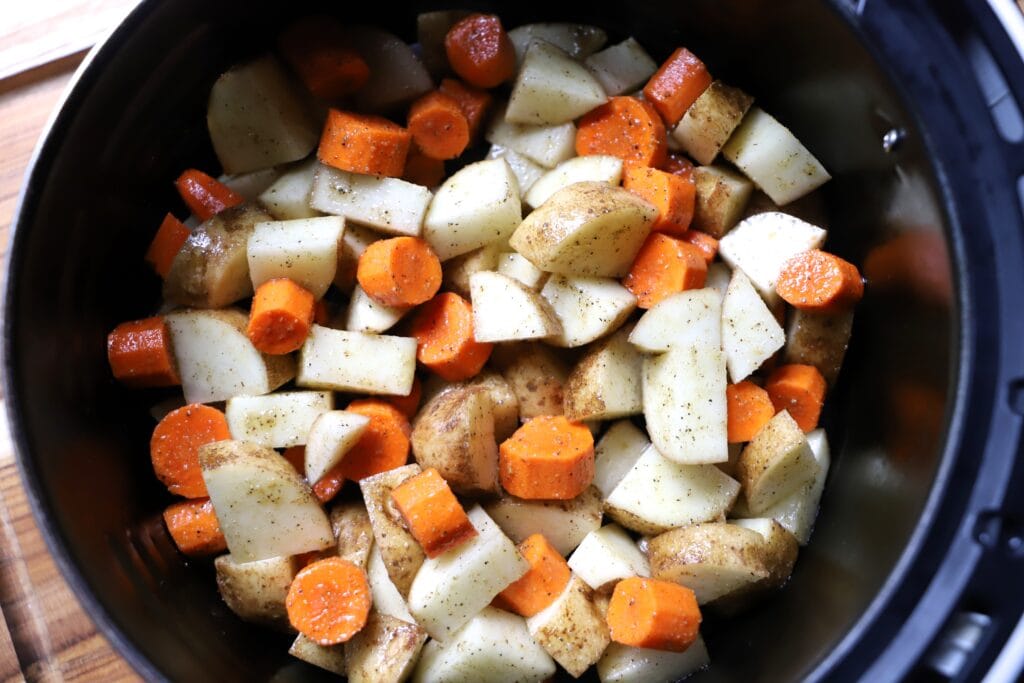 Carrots and Potatoes in an Air Fryer Basket