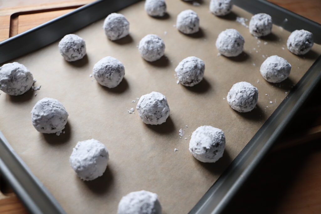 Roll cookie dough into even-sized balls