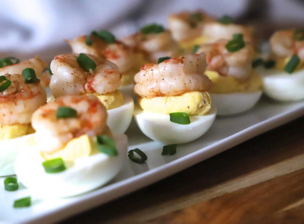 Cajun Deviled Eggs with Shrimp on a plate